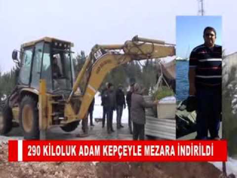 290 kiloluk adam kepçeyle mezara indirildi