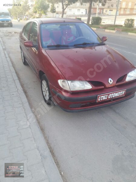 Utku otodan satilik 99 megane cift hava yastikli abs klima orjin