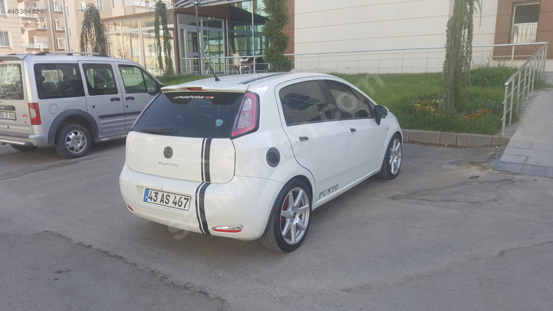 Memurdan 2013 model fiat punto 1.4 pop 87.000 km 'de
