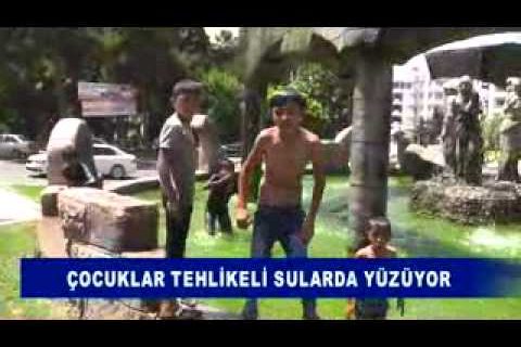 çocuklar tehlikeli sularda yüzüyor