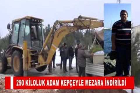 290 kiloluk adam kepçeyle mezara indirildi