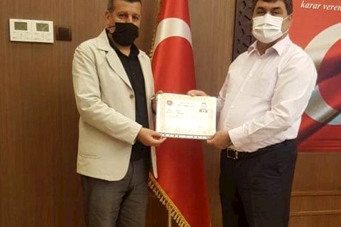 Kaymakam Şahin'den Yazar'a Üstün Başarı Belgesi*