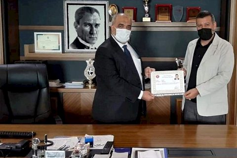 Hasan Yazar'a Üstün Başarı Belgesi